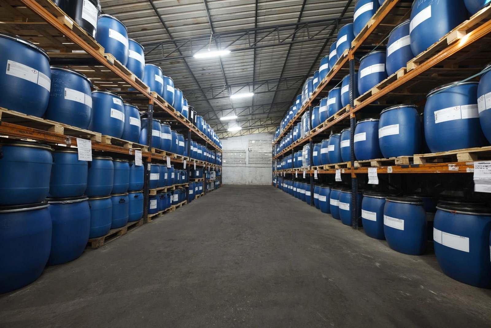 Chemical warehouse with stocked drums and bags ready for dispatch